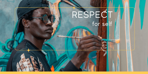 Young adult man painting a colorful mural as an act of self-expression, symbolizing authentic living exercises and respect for self.